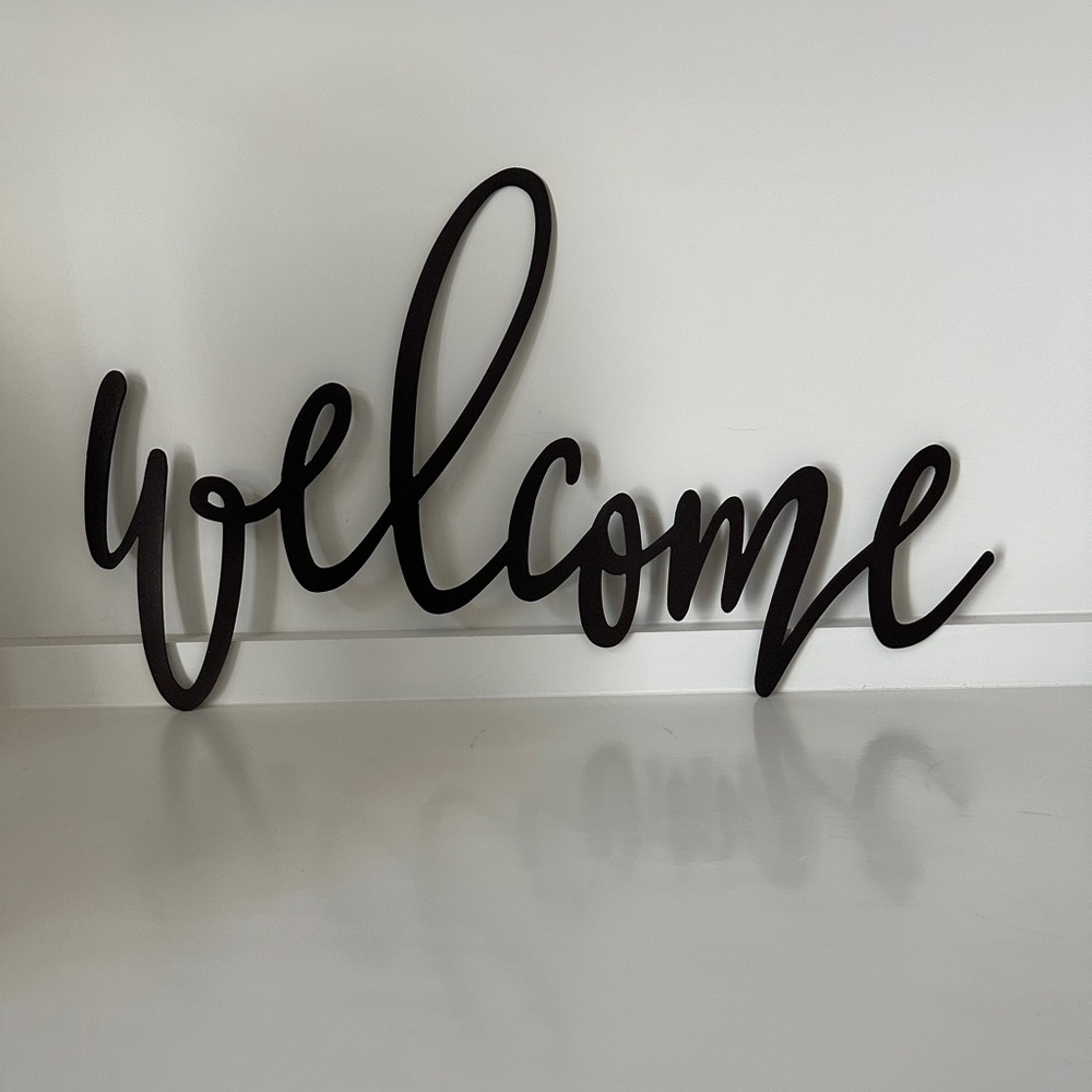 Iron Welcome sign